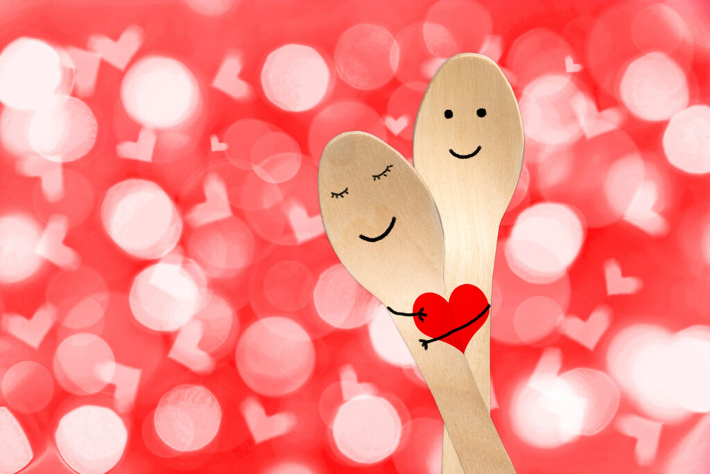 smiley painted on spoons, valentines day background