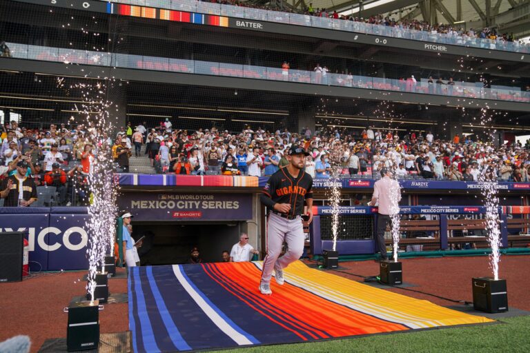 San Francisco Giants Michael Conforto enters the field for an MLB baseball game against the San Diego Padres, at the Alfredo Harp Helu Stadium in Mexico City, Saturday, April 29, 2023. (AP Photo/Fernando Llano)